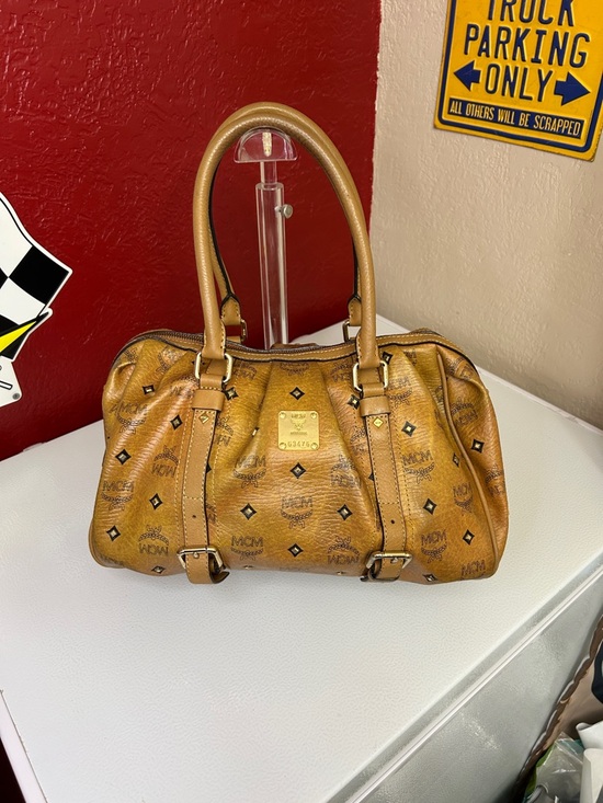 MCM Handbags - MCM Cognac Logo Visetos Barrel Satchel with Gold Plaque